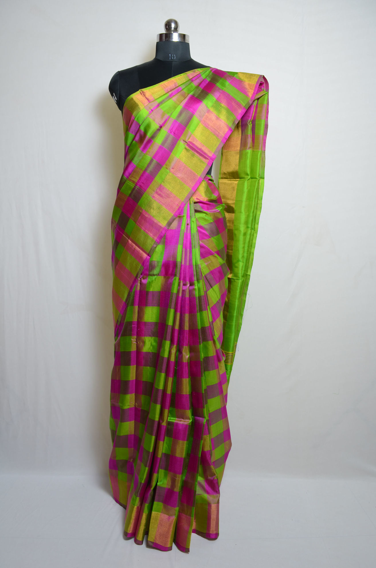 Tvis and Bliss. Pink and Green Checks Uppada Silk Saree