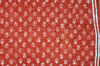 Picture of Brick Red Dabu Print Malmal Cotton Dress Material